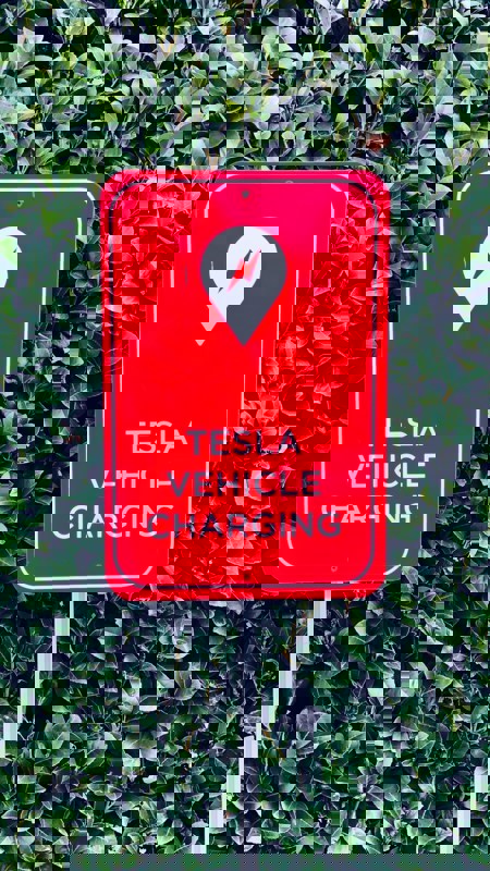 Tesla Vehicle Charging Station Sign Photo by John Cameron