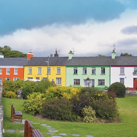 Colorful houses line a street in Sneem