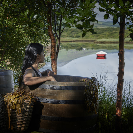 Lady in the barrel overlooking Sneem Bay